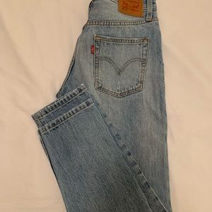 Levi’s 501 jeans with distressing details